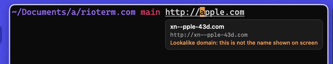 A link in the terminal underlined on hover, with a card showing the resolved punycode host and a lookalike domain warning
